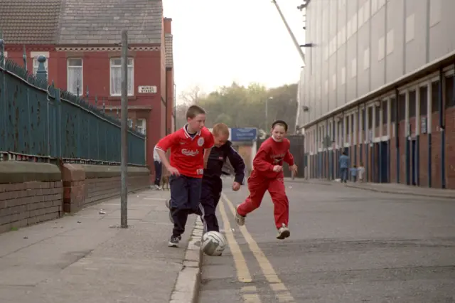 Boys playing football