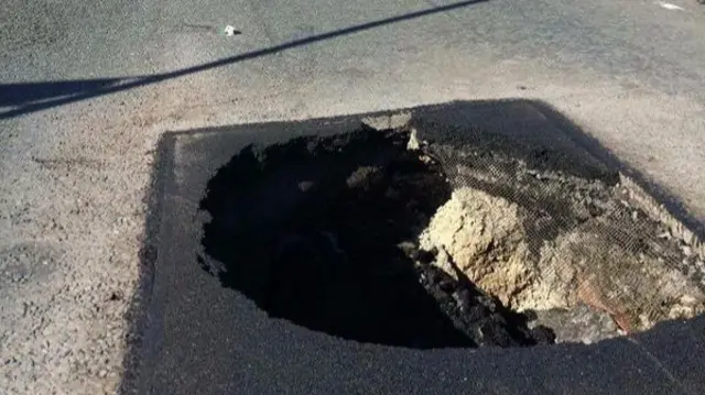 The hole in the road