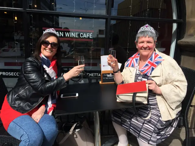 Ladies enjoying prossecco outside Vino bar