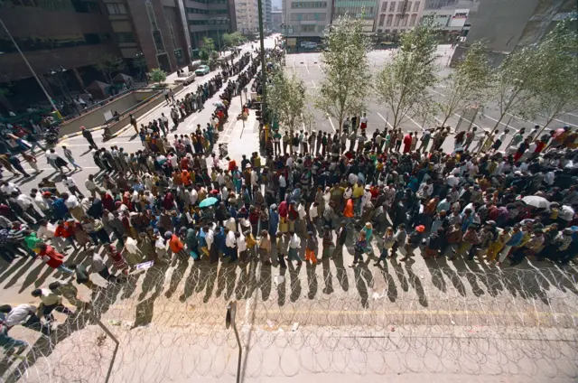 People queuing to vote in South Africa in 1994