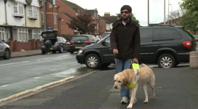 Mohamed Khatri and his guide dog