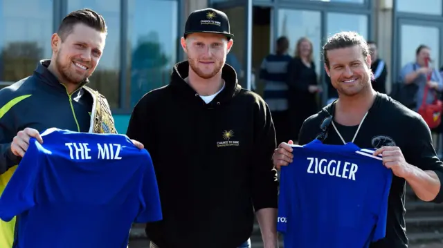 Ben Stokes (centre) with The Miz and Dolph Ziggler