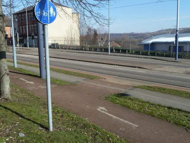 Tram tracks intersecting with cycle paths