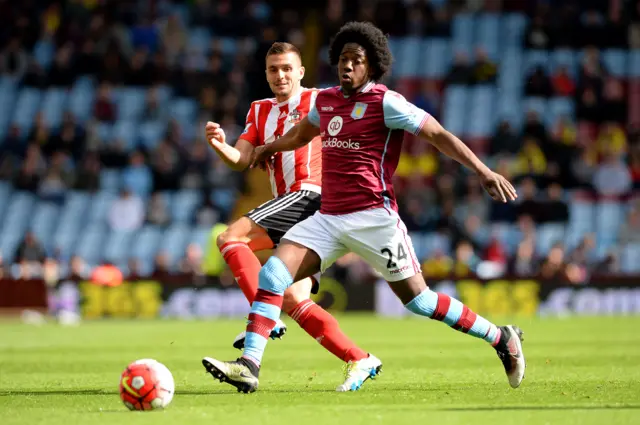 Carlos Sanchez and Dusan Tadic in action