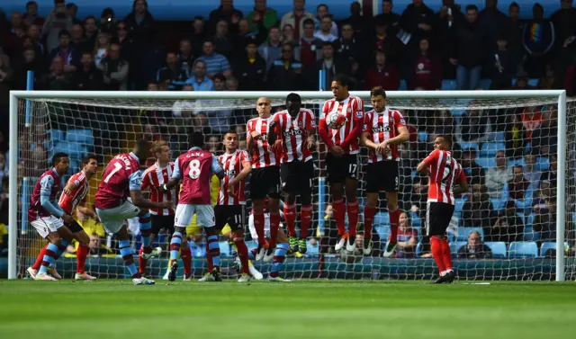 Leandro Bacuna takes a free-kick