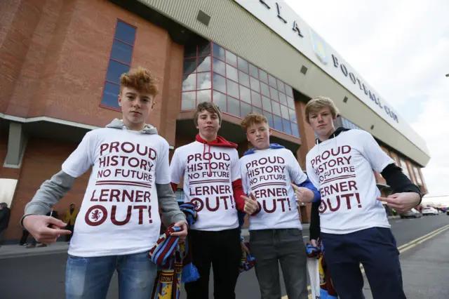 Aston Villa fans wear 'Lerner out' t-shirts