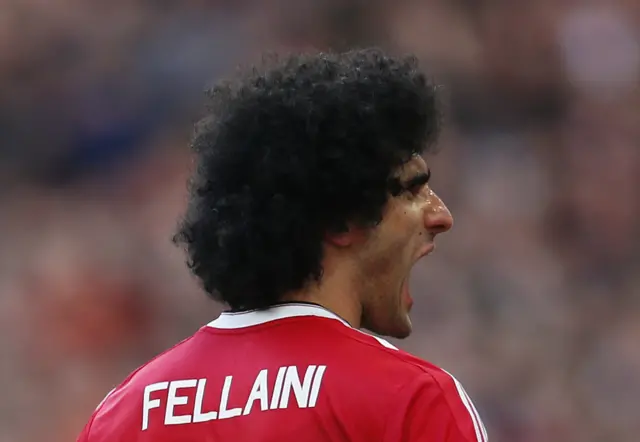 Marouane Fellaini celebrates