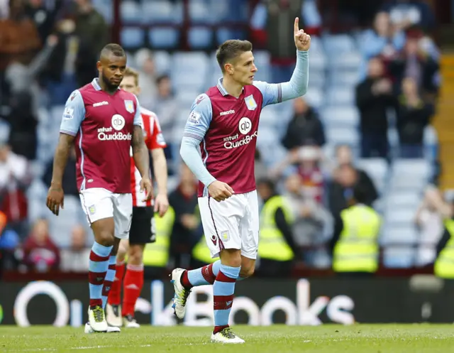 Ashley Westwood celebrates