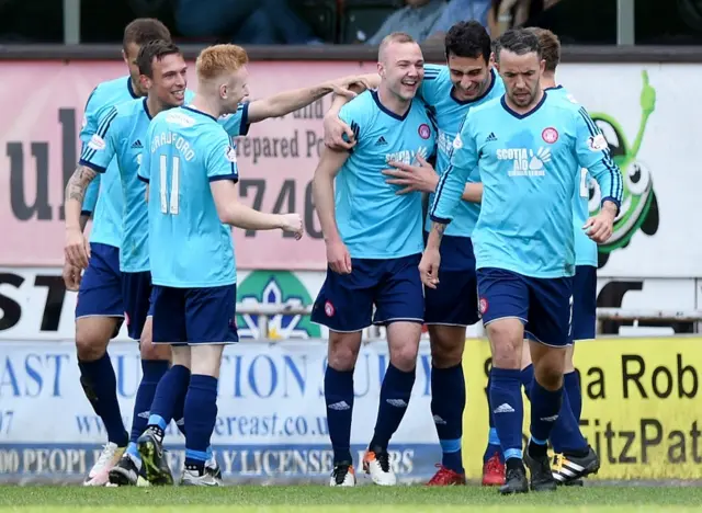 Hamilton celebrate Grant Gillespie's opening goal at Tannadice