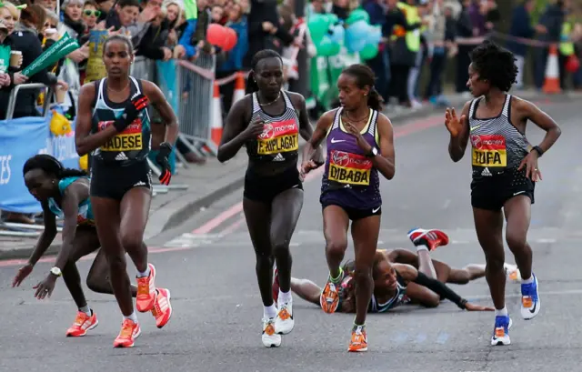 Elite runners crash and fall