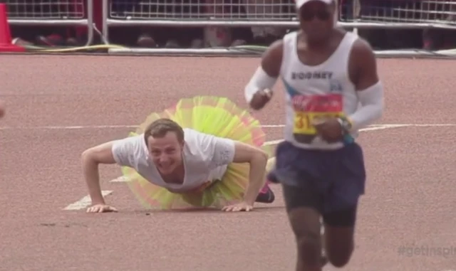 A man doing press ups in the London Marathon