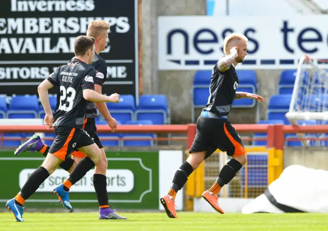 Kallum Higginbotham (right) celebrates opening the scoring