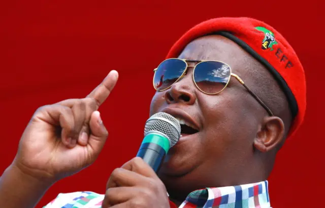 South African leader of the Economic Freedom Fighters (EFF) party and former African National Congress (ANC) Youth League leader Julius Malema addresses supporters during an election campaign rally in Umlazi, south of Durban, South Africa, on April 27, 2014