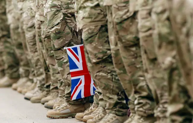 Soliders boots by a Union Jack