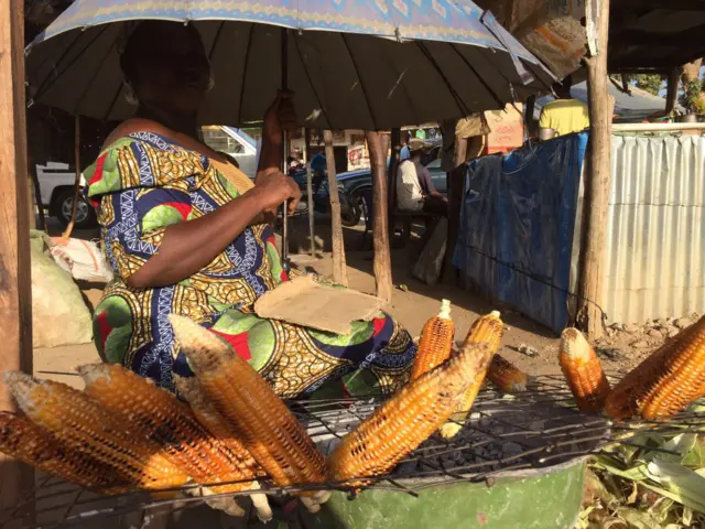 A woman selling roasted maize in Nigeria's Bauchi city