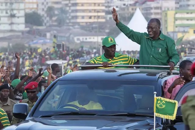 John Magufuli waves to supporters after addressing a rally by ruling party Chama Cha Mapinduzi (CCM) in Dar es Salaam, Tanzania on October 23, 2015