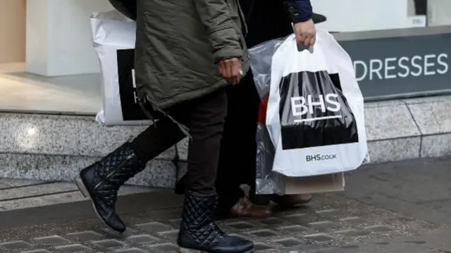 Shoppers with BHS bags