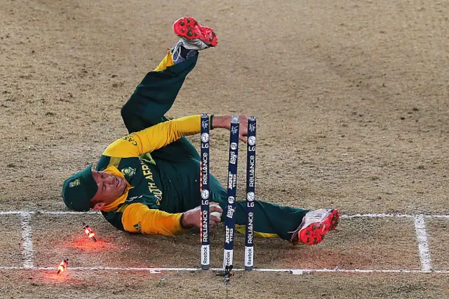 AB de Villiers of South Africa falls over the stumps during the 2015 Cricket World Cup Semi Final match between New Zealand and South Africa at Eden Park on March 24, 2015 in Auckland, New Zealand