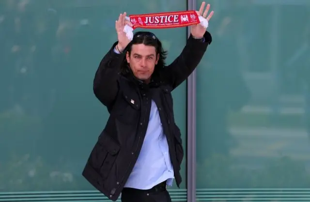 Supporter outside court in Warrington