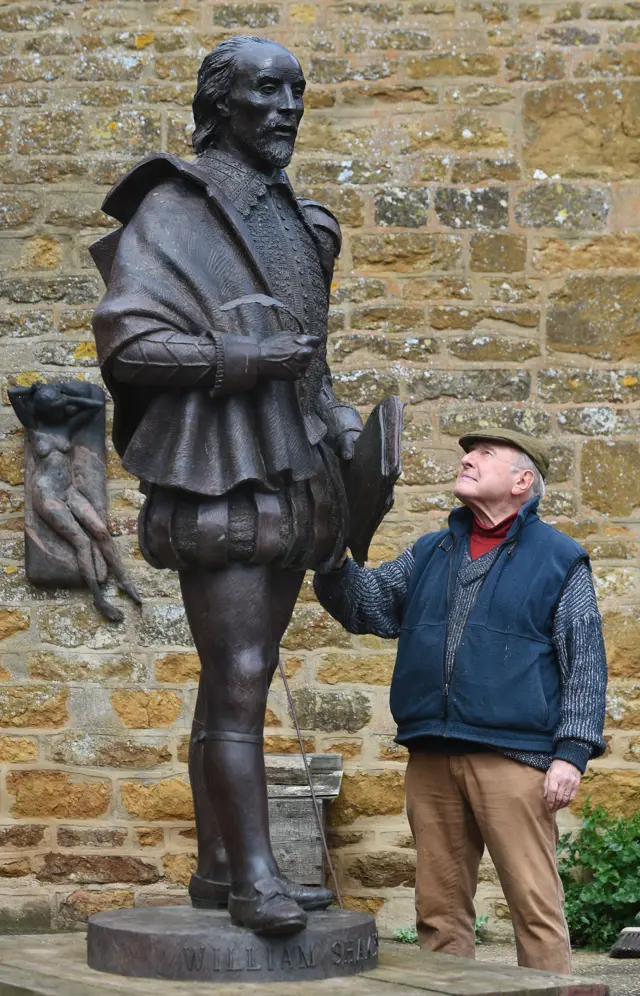 James Butler with statue