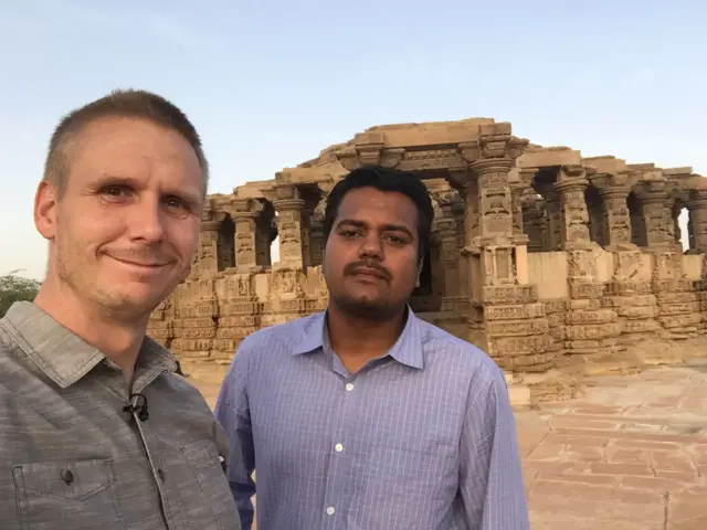 Pop Up's Christian Parkinson and Vikas Pandey before sunset at the Kiradu temple in Rajasthan