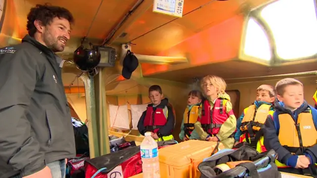 Children visit Transat yacht