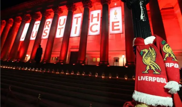 Flowers are laid and candles are lit at St George's Hall