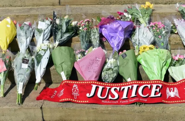 Floral tributes on steps of St George's Hall