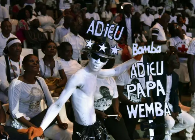 Fans of the late Papa Wemba, attend a concert in tribute to him at the Palace of Culture in Abidjan