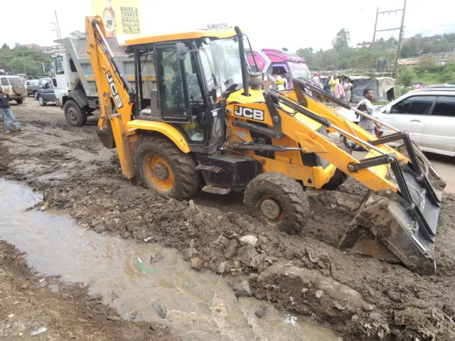 Digger trying to clean up the mud in Nairobi