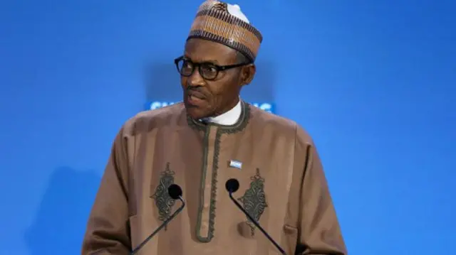 President Buhari at the lectern