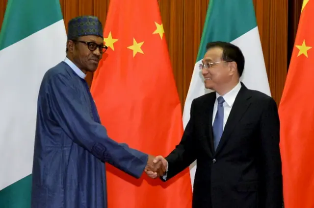 President Buhari shakes hand of China's Xi Jinping