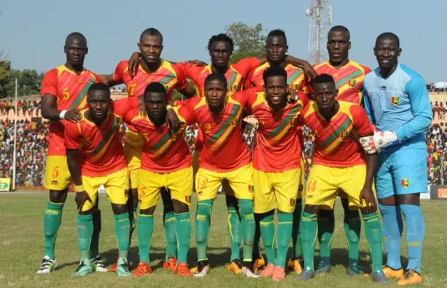 Guinea national team line up for photo