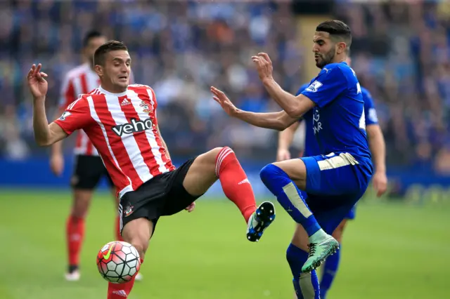 Riyad Mahrez is fouled by Southampton's Dusan Tadic