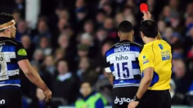 Anthony Watson was shown a straight red card after taking Saracens full-back Alex Goode out in the air