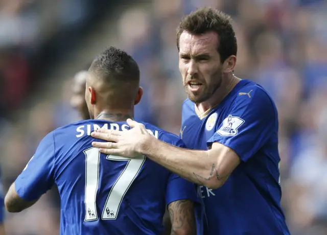 Christian Fuchs congratulates Danny Simpson