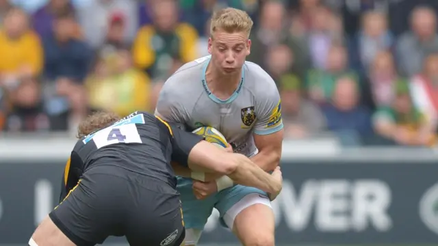 Joe Launchbury of Wasps tackles Harry Mallinder of Northampton