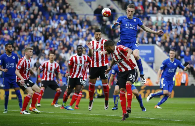 Jamie Vardy of Leicester jumps for the ball