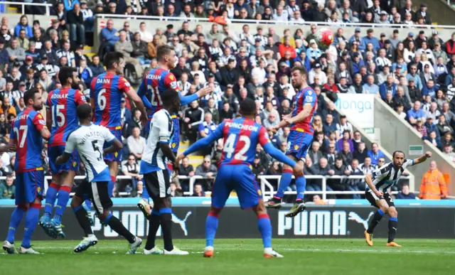 Andros Townsend takes a free-kick