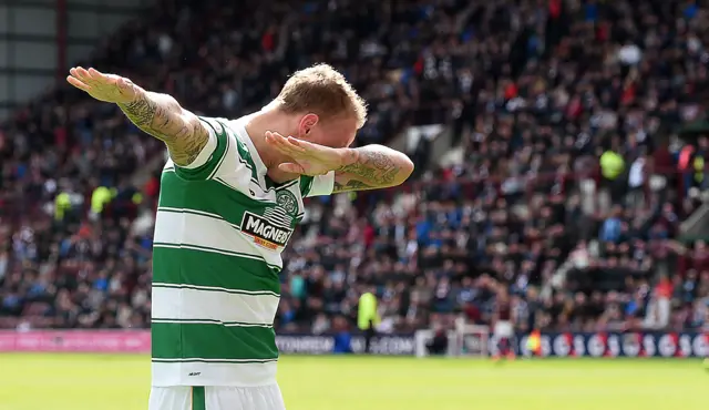 Celtic striker Leigh Griffiths celebrates scoring his side's third goal