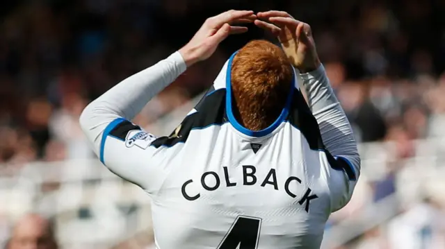 Jack Colback reacts