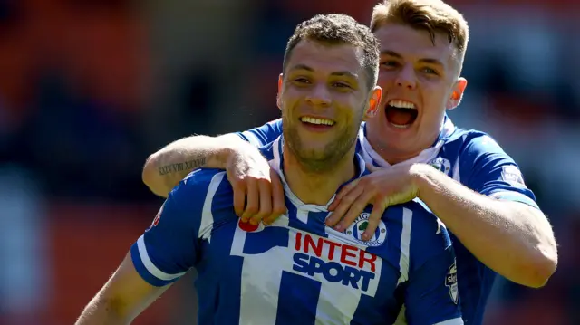 Yanic Wildschut of Wigan Athletic celebrates