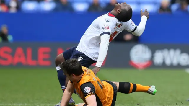 Harry Maguire fouls Emile Heskey