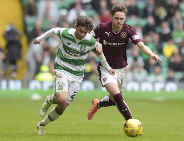 Celtic winger Patrick Robert tussles for possession with Hearts' Sam Nicholson