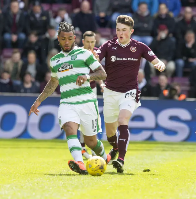 Celtic's Colin Kazim-Richards and Heats defender John Souttar tussle for possession