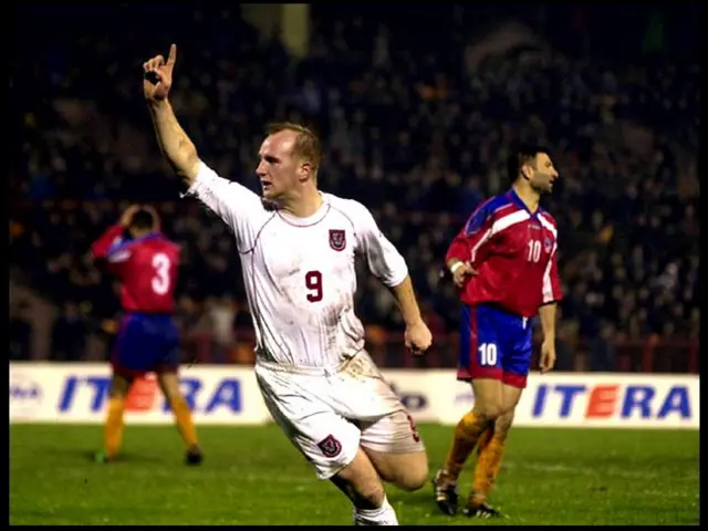 John Hartson celebrates