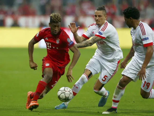 Kingsley Coman runs with possession