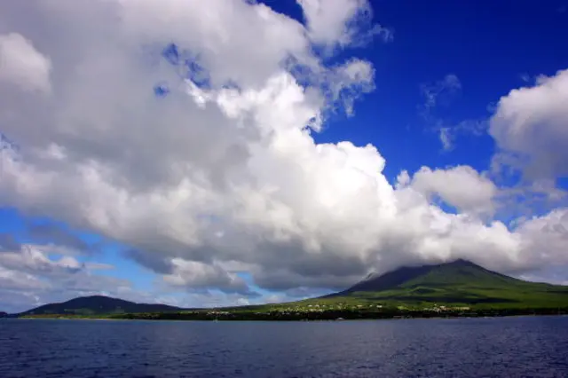 Clouds are seen above the island of Nevis