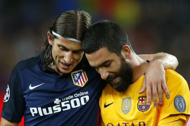 Filipe Luis and Arda Turan at full-time