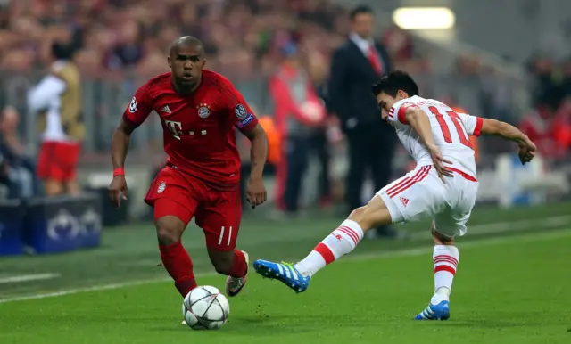 Douglas Costa with possession